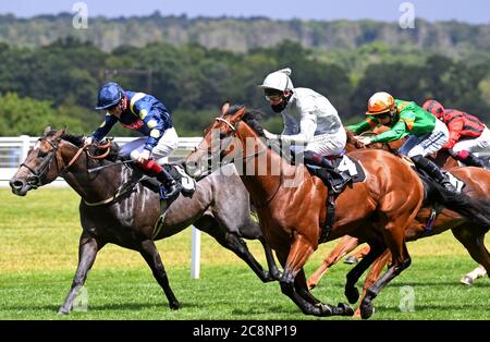 Tenbury Wells ridden by jockey Robert 'Rab' Havlin (centre) on their way to win the Betfred Mobile Handicap Stakes at Ascot Racecourse. Stock Photo