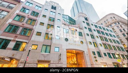 BOSTON - SEPTEMBER 12, 2015: Tourists along city streets. Boston attracts one and a half million people annually. Stock Photo