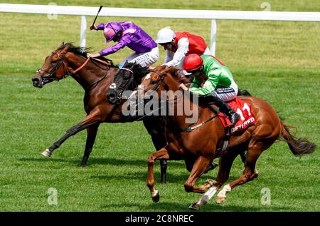 Tone The Barone ridden by jockey Harry Bentley (right) on their way to win the Play Nifty Fifty Exclusively At Betfair Handicap Stakes at Ascot Racecourse. Stock Photo
