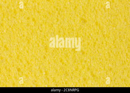 Light yellow ethylene vinyl, acetate foam texture with porosity. Stock Photo