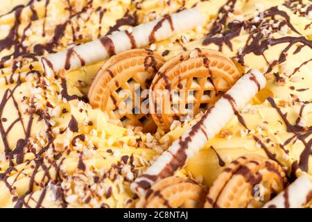 Oange ice-cream with cookies and chocolate glaze. Stock Photo
