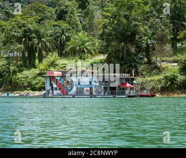 Kenyir, Malaysia - July 22, 2020: Houseboat is anchored in Kenyir Lake. Malaysia tourist attraction both for local and international. Stock Photo