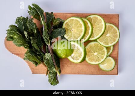 Mohito coctail ingredients on wooden board. Stock Photo