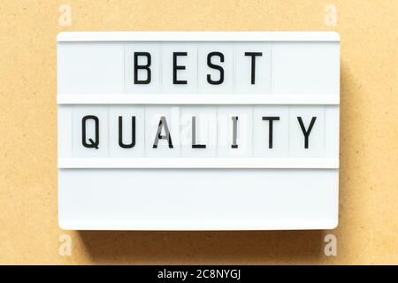 Lightbox with word best quality on wood background Stock Photo