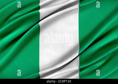 Colorful Nigeria flag waving in the wind. Stock Photo