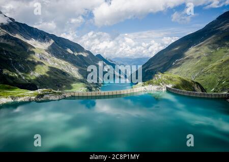 Aerial view of lake Mooserboden and dam wall, Kaprun High Mountain reservoirs, Salzburg, Austria Stock Photo