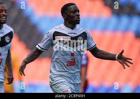 Lugano, Switzerland. 29th Nov, 2020. Cristopher Lungoyi (#8 FC Lugano) and  Albian Hajdari (#76 FC Basel 1893) in action during the Swiss Super League  match between FC Lugano and FC Basel 1893