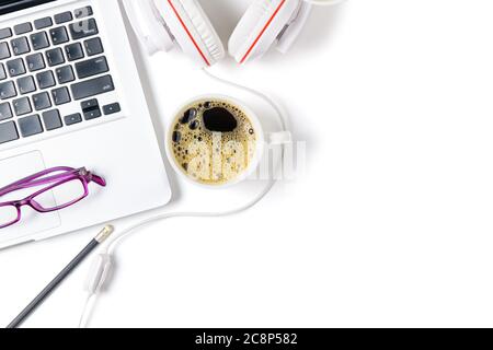 Laptop and headphone with black coffee isolated on white background, top view and copy space Stock Photo