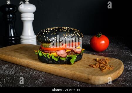 Black hamburger made from beef, with jalapeno pepper Stock Photo