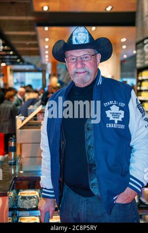 Toronto, Canada - November 30, 2011:  Former Toronto Maple Leaf 4 time Stanley Cup Champion Eddie 'The Entertainer' Shack at the reopening of Maple Leaf Gardens as a Loblaws grocery store. Stock Photo
