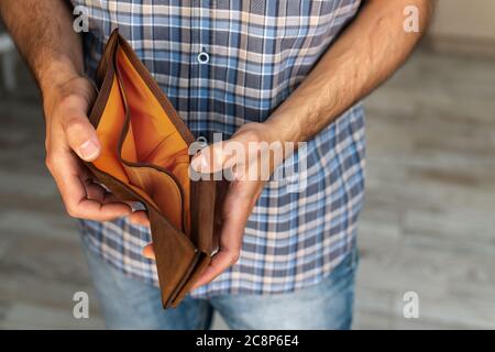Man hand open an empty wallet Stock Photo