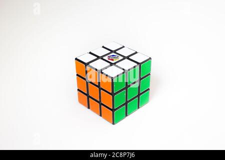 Close up of a Rubik's Cube, the famous brainteasing 3D combination puzzle, isolated on white background. Brainteaser game, toy. Concept challenge. Stock Photo