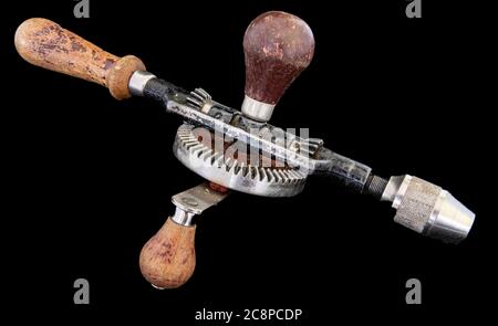 Vintage Hand Drill on a black Background Stock Photo