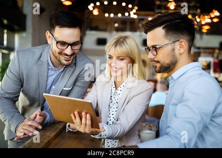 Business colleagues having conversation during coffee break Stock Photo