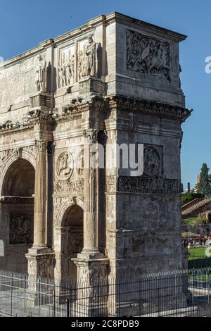 Rome, Italy, 25.12.2019: Arch of Costantine in Rome in cloudy day with tourist Stock Photo