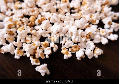 Top view of homemade Pop corns isolated on dark background Stock Photo