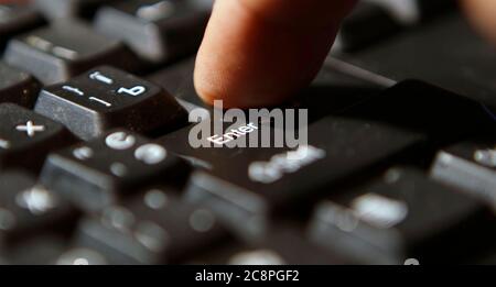 Black computer keyboard super close up stock footage. Black computer enter keys Stock Photo