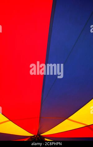 colorful circus tent top seen from inside Stock Photo