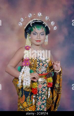 bride at her traditional javanese wedding ceremony between mixed race couple in rural village east java indonesia 2002 Stock Photo