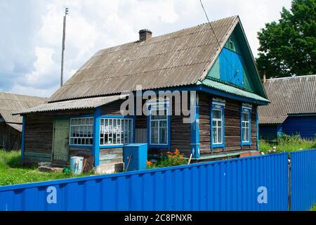 A typical folk village house in the countryside of Belarus Stock Photo