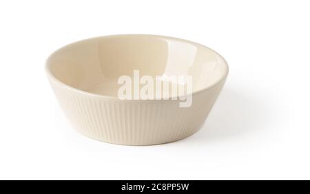 Empty beige ceramic bowl or ramekin isolated on a white background. Empty crockery for food design. Clay, ceramics or porcelain tableware. Front view. Stock Photo