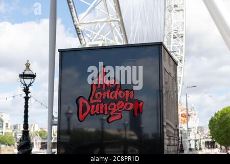 The London Dungeon located in the County Hall building by the Thames river, a tourist attraction offering macabre historical events in gallow humour. Stock Photo