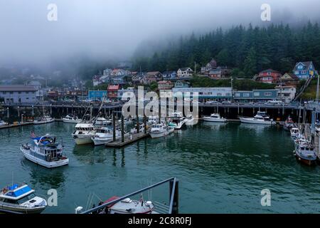 Ketchikan, Alaska - jul 23, 2018 - view of harbour of Ketchikan with fishing boats and mist Stock Photo