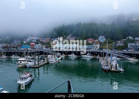 Ketchikan, Alaska - jul 23, 2018 - view of harbour of Ketchikan with fishing boats and mist Stock Photo