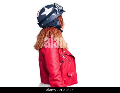 Handsome athletic male american football player holding his helmet in arms  looking at camera with cheerful and confident expression posing on white ba  Stock Photo - Alamy