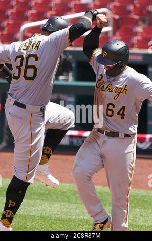 St. Louis, United States. 26th July, 2020. Pittsburgh Pirates José Osuna (36) celebrates his two run home run with teammate Phillip Evans as he touches home plate in the fourth inning against the St. Louis Cardinals at Busch Stadium in St. Louis on Sunday, July 26, 2020. Photo by Bill Greenblatt/UPI Credit: UPI/Alamy Live News Stock Photo