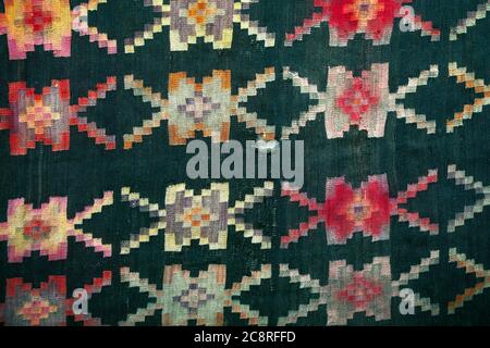 Ragged carpet made in old balkan style Stock Photo