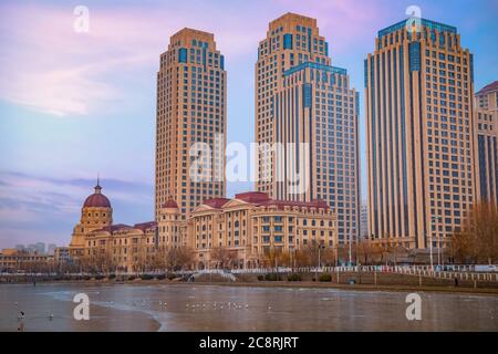 Tianjin, China - Jan 16 2020: Cityscape of Tianjin city with buiding and architecture on the side of Haihe river bank Stock Photo