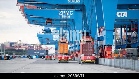 Hamburg, Germany. 16th July, 2020. At Container Terminal Altenwerder in the Port of Hamburg, containers are moved by driverless 'Automated Guided Vehicles', or AGVs for short. Credit: Daniel Reinhardt/dpa/Alamy Live News Stock Photo