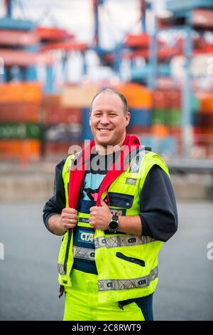 Hamburg, Germany. 16th July, 2020. Crane driver Torben Lehmann, recorded at Container Terminal Altenwerder in the Port of Hamburg. Credit: Daniel Reinhardt/dpa/Alamy Live News Stock Photo