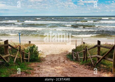 Scenic view of Baltic Sea white sand beach. Beautiful sea landscape in Poland. Stock Photo