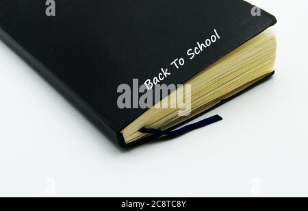 Black notebook isolated on white background. Back to school concept Stock Photo