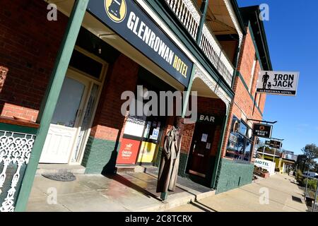 Glenrowan, Victoria. A Ned Kelly statue stands guard at the entrance to the bar of the Glenrowan Hotel in Gladstone Street, Glenrowan. Stock Photo