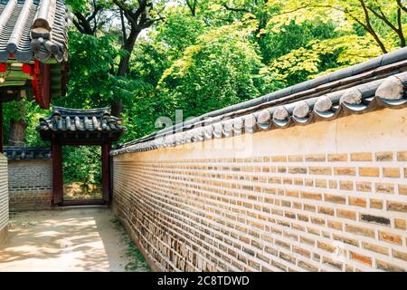 Korean traditional architecture with summer green trees at Jongmyo Shrine in Seoul, Korea Stock Photo