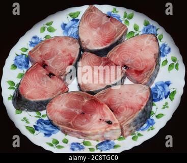 Uncooked or raw fish steaks of Hilsa Fish also called as Tenualosa Ilisha Stock Photo