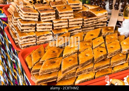 Traditional Uzbek sweet nutty cookies. Oriental sweets on the market Stock Photo