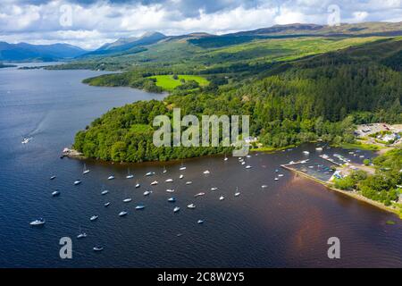 Aerial view of village of Balmaha on shores of Loch Lomond in Loch Lomond and The Trossachs National Park, Scotland, UK Stock Photo