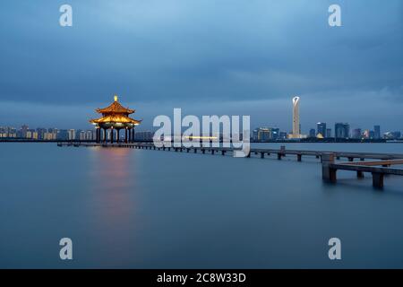 City landscape around the lake. Photo in Suzhou, China. Stock Photo