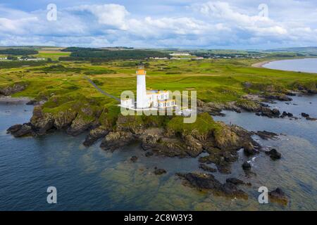 Aerial view of lighthouse at 9th green on Ailsa golf course at Trump Turnberry resort in Ayrshire, Scotland, UK Stock Photo