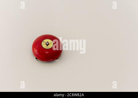 Industrial Fire Emergency Warning Bell on wall, Copy Space Stock Photo