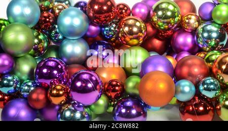 Full frame abstract view of a lot of Christmas baubles in  many different colors. Stock Photo