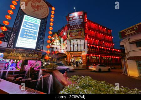 A brightly lit building in the main Jonker District of Malacca, Malaysia at night Stock Photo