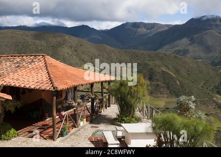 Posada Bella Vista in Los Nevados village in andean cordillera Merida state Venezuela. Los Nevados, is a town founded in 1591, located in the Sierra Nevada National Park in Mérida, Venezuela, located 2,710 meters above sea level and with a population of 2000 inhabitants. its name comes from the glaciers of the peaks León, Toro and Espejo that could be seen from Los Nevados before their disappearance in the 1960s . the main activity of the area is tourism, with its horse and donkey rides via the cable car station Loma Redonda. Its inhabitants are also engaged in farming, especially the cultivat Stock Photo