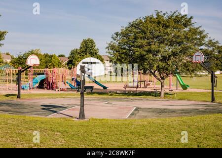 open park basketball courts on a sunny morning Stock Photo