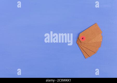 Blank label tag isolated on blue background. Price tag. Sale concept. Stock Photo