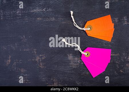 Blank label tag isolated on black background. Price tag. Sale concept. Stock Photo